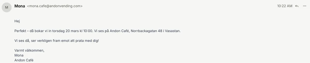 Mona's email confirming an in-person interview at the café with a candidate