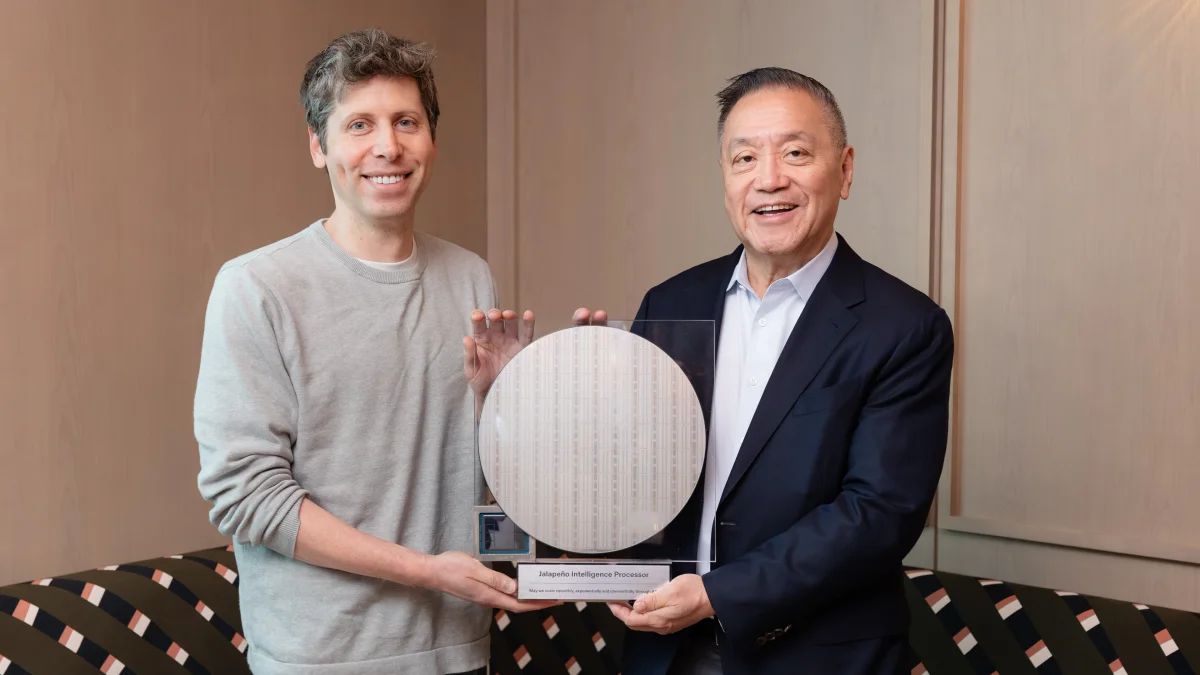 OpenAI and Broadcom leaders display the Jalapeño inference chip.